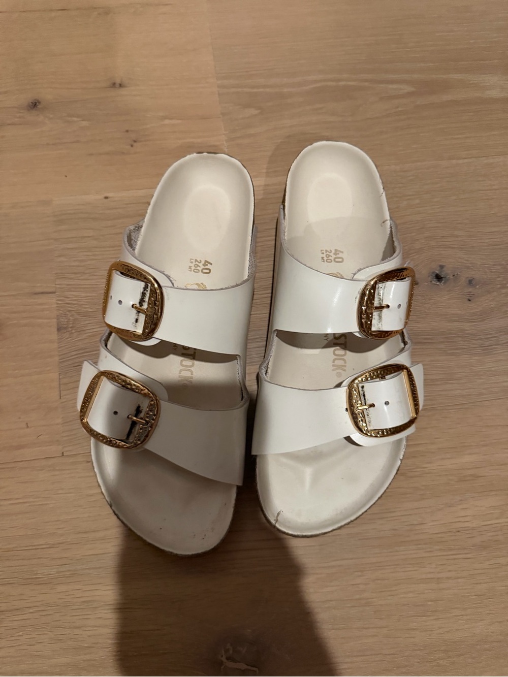 Birkenstock White Sandals with Gold Buckles